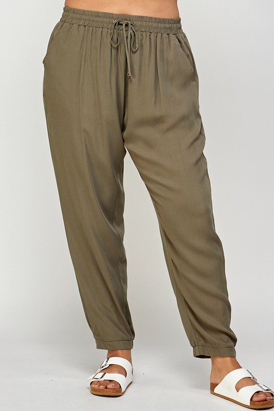 Olive green drawstring jogger pants.