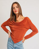 Here's an alt tag for the image: Rust-colored cowl neck long sleeve top.