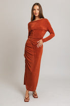 Here's an alt tag for the image: Rust-colored cowl-neck maxi dress.