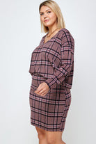 Plus-size mauve plaid sweater and skirt.