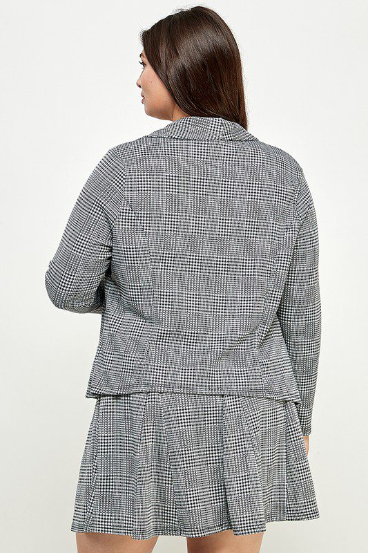 Grey plaid blazer and pleated skirt.