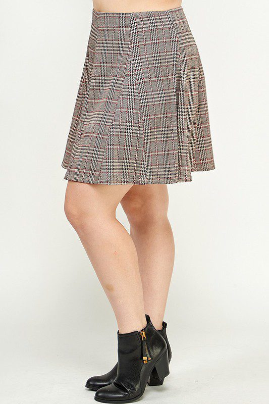 Plaid skater skirt and black ankle boots.