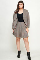 Plus-size plaid suit, skirt, and jacket.