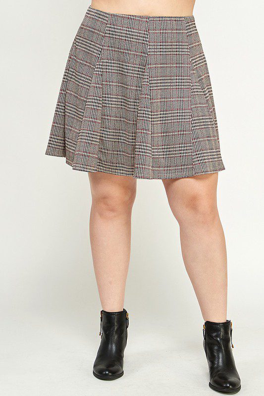 Plaid skater skirt and black boots.