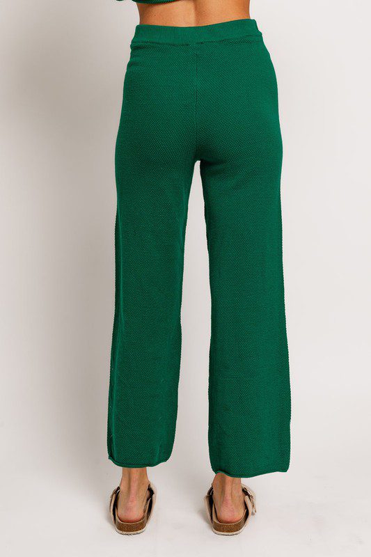 Green knit wide-leg pants.