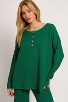 Green waffle knit henley top and pants.