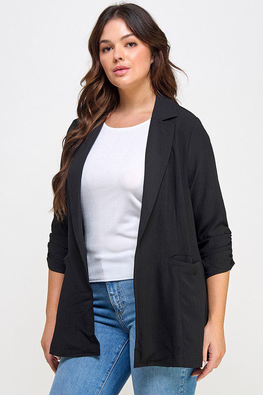 Plus-size black blazer, casual style.