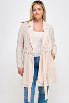 Beige belted linen-look jacket.