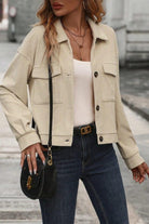 A woman wearing jeans and a jacket.