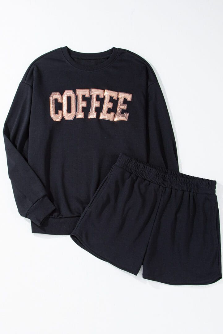 A black sweatshirt and shorts set with the word coffee on it.