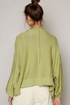 Sage green balloon sleeve knit sweater.