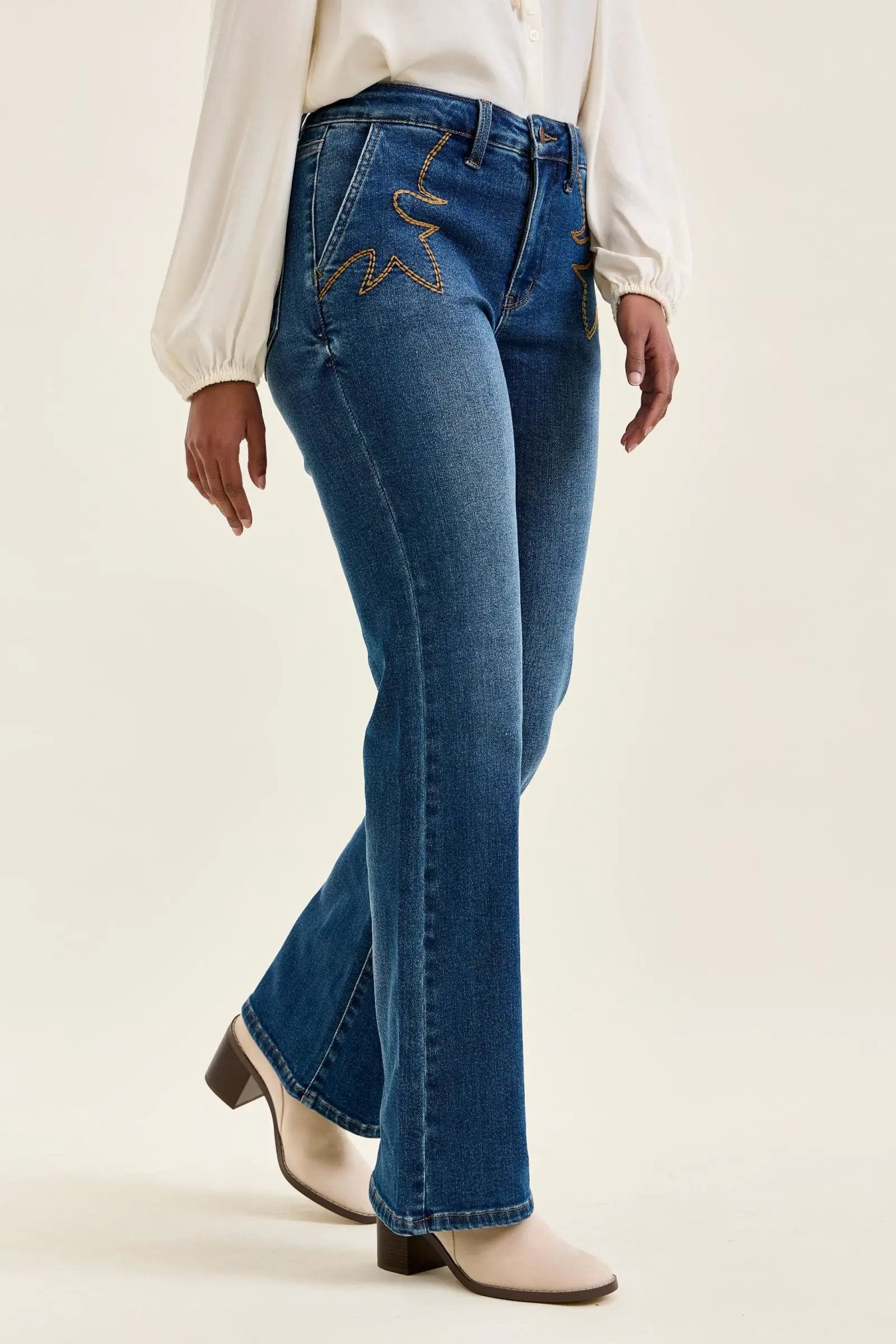 Judy Blue Daisy mid-rise tummy-control bootcut jeans in blue denim with Western stitching