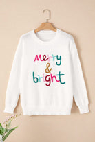 A white sweater with the words merry and bright written on it.