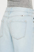 A close up of the back pocket on a pair of jeans.