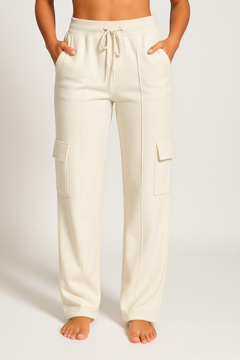 Grateful Threads Boutique cream cargo sweatpants with high waist and drawstring. Casual wide-leg pants.