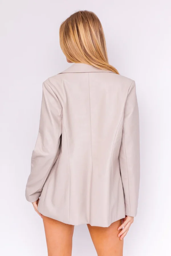 Beige leather blazer, back view.