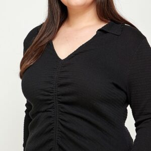 Black long-sleeve cinched top.