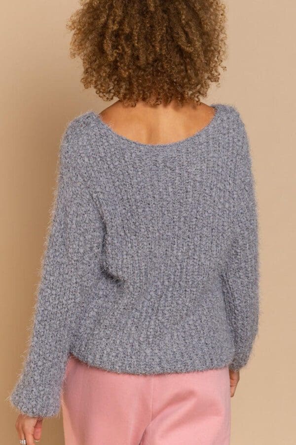 Gray fuzzy knit sweater, back view.